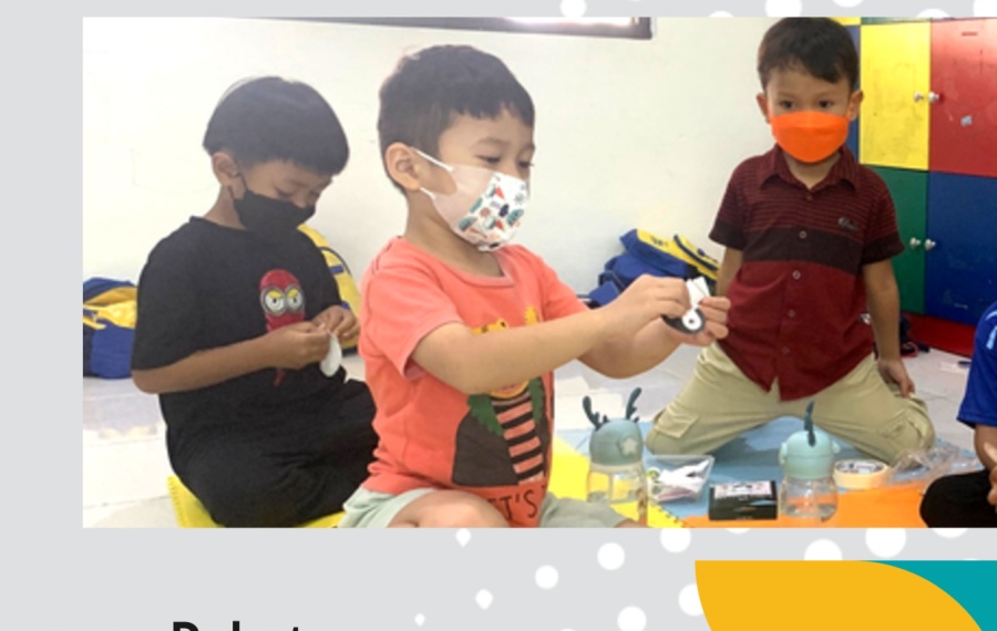 Children joining a robotics workshop